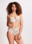Miękki biustonosz balkonetka ivory z kwiatowym printem i koronką prezentowany na modelce.