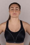 Biustonosz sportowy na modelce – czarny model soft mocno trzymający