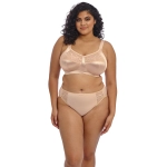 Modelka nosi beżowy komplet bielizny plus size z pełnym biustonoszem i wysokimi majtkami.
