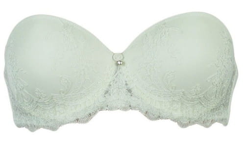 Kremowy koronkowy biustonosz typu strapless bez ramiączek.